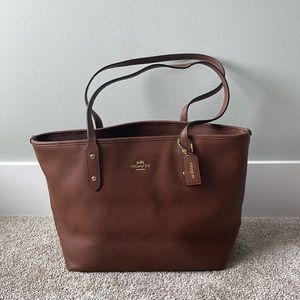 Brown leather coach bag
